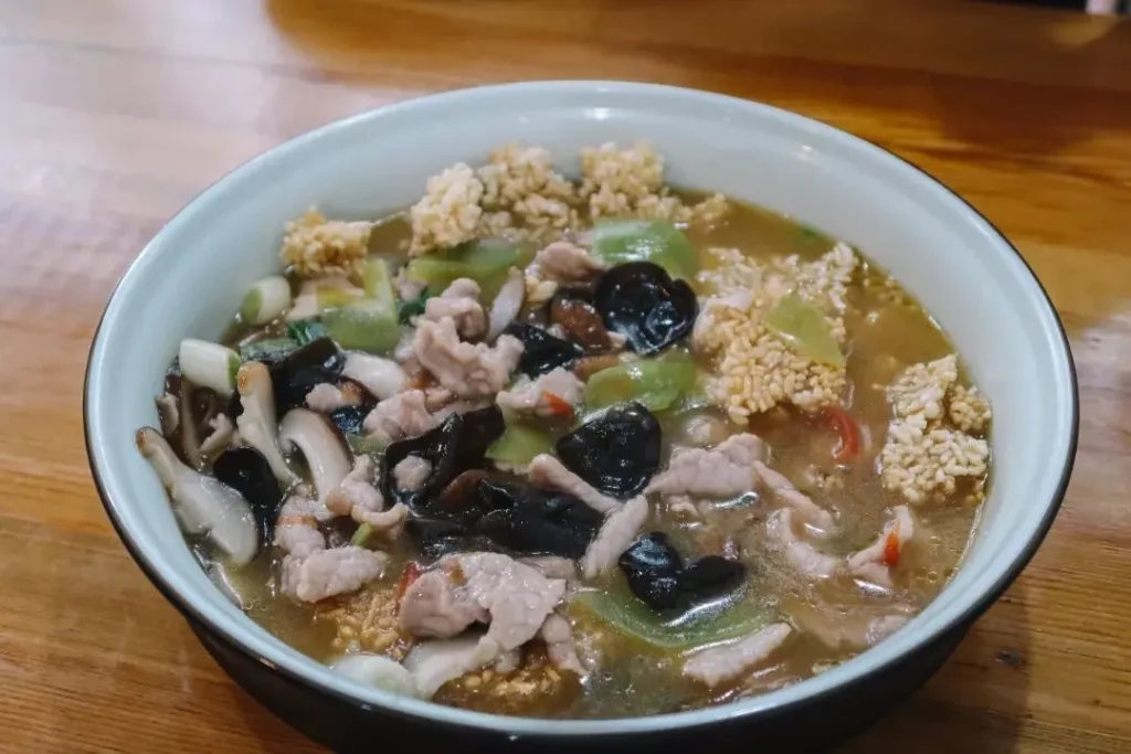 Crispy Rice with Sliced __Pork