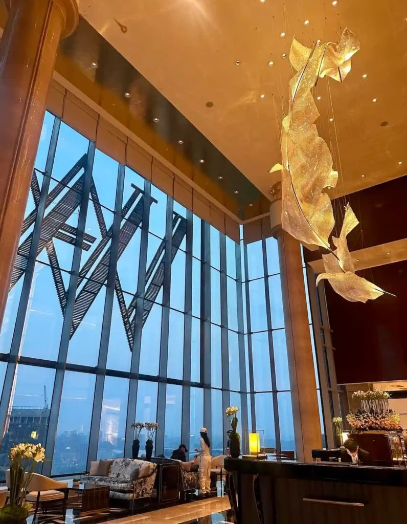 Sleek lobby with art installation at Waldorf Astoria